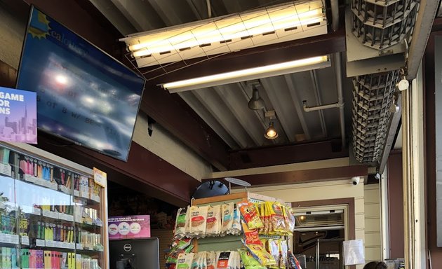 Photo of Sheltams Newsstand and USPS