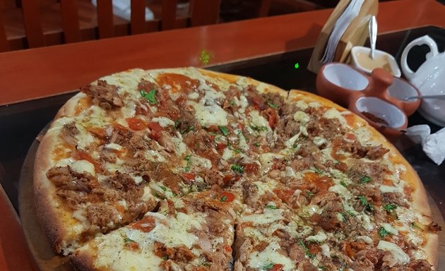 Foto de Pizzeria Zeus y más