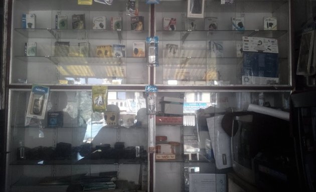 Photo of Sri Triveni Mobile Service And Flashing Center