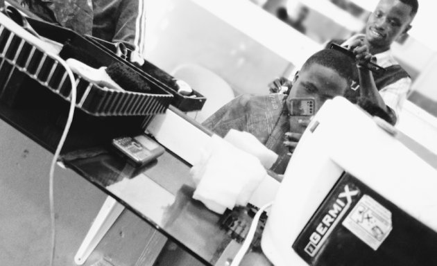 Photo of Santasi Anyinam, Slick the Barbershop