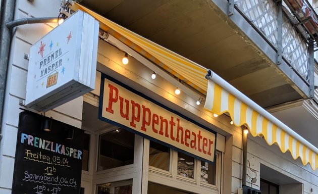 Foto von Puppet theater ice cream shop