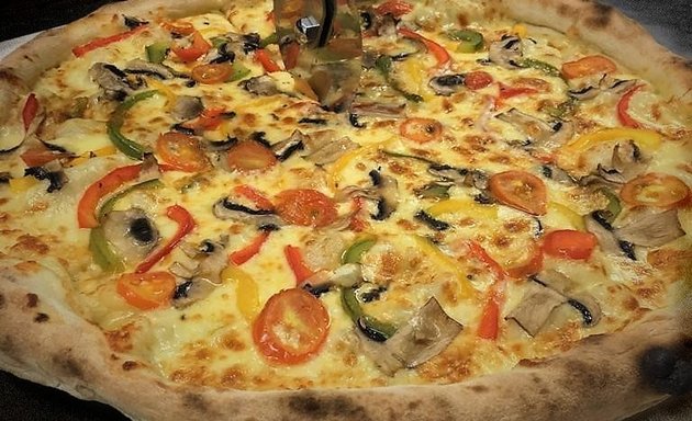 Foto de AMERICANA pizzas and subs