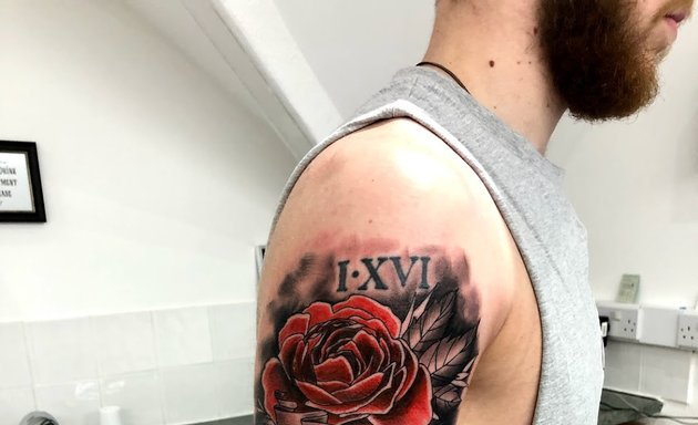 Photo of Autumn Rose Tattoo
