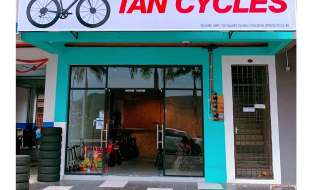 Photo of tan Cycles Shop
