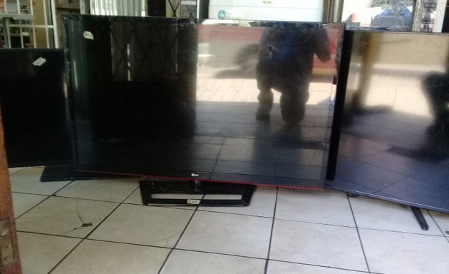 Photo of TV Microwave Repairs Electric Wizard Joburg CBD