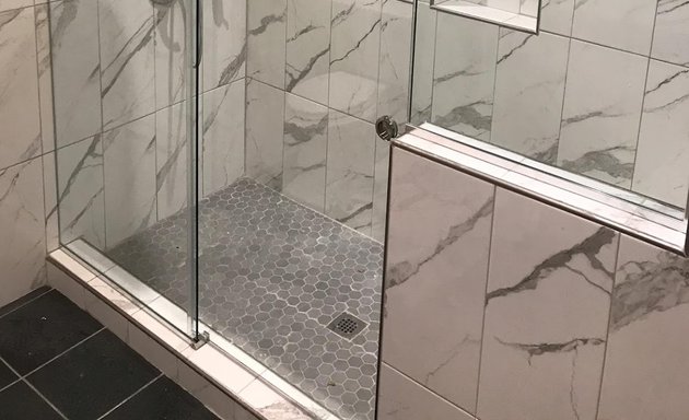 Photo of Frameless shower doors enclosure, sliding doors