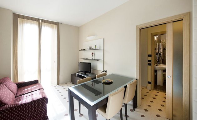 foto Orologio Living Apartments