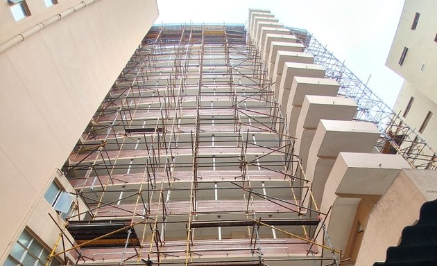 Photo of posch scaffolding painting and insulation