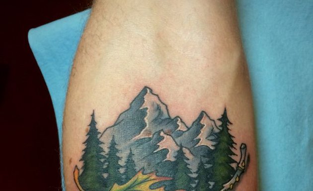 Photo of Mammoth American Tattoo