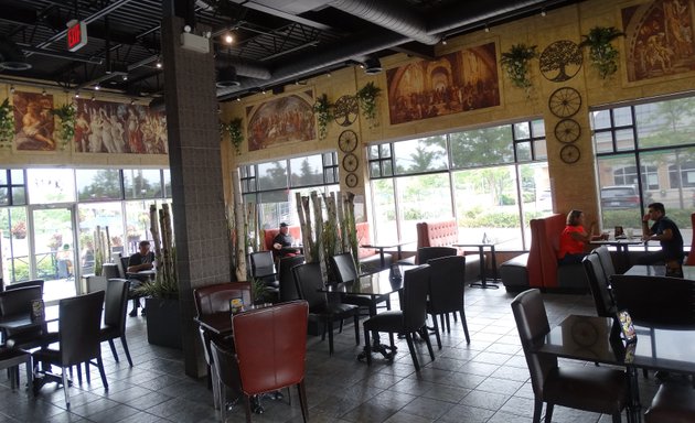 Photo of Symposium Cafe Restaurant & Lounge