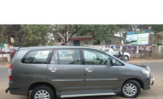 Photo of Rashmi Travels - Innova Car Rent / Car Hire Service