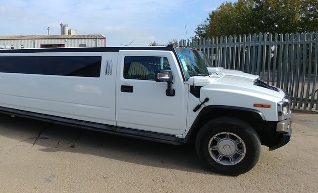 Photo of Men In White Limos