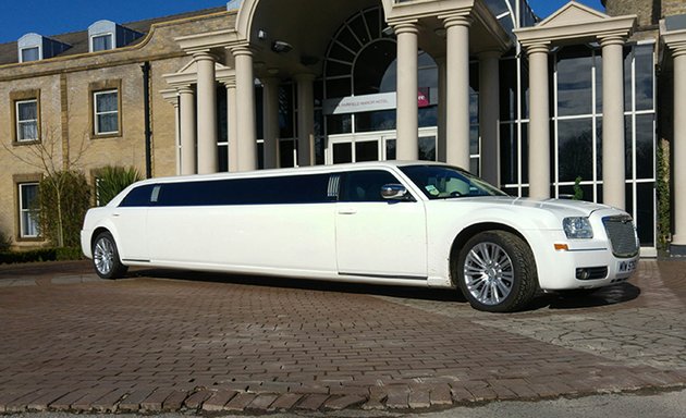 Photo of Men In White Limos