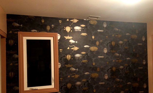 Photo of JC Wallpaper Hanging