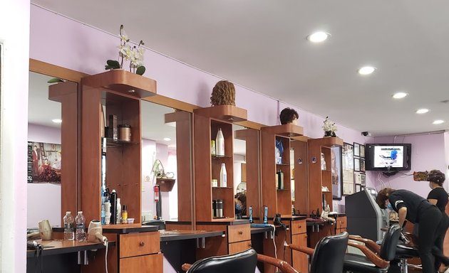 Photo of LUISIANY'S DOMINICAN SALON [Anti-frizz Silk Blowout | Hair Botox | Hair Color | Dominican Blow Out]
