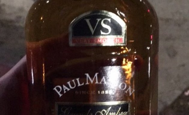 Photo of P. M. Liquor