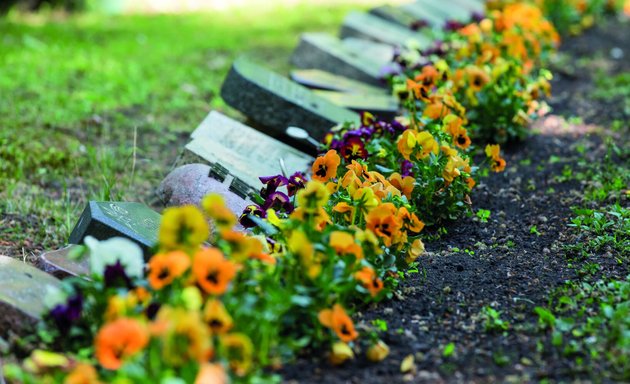 Foto von Blumenladen auf dem Friedhof "In den Kisseln"
