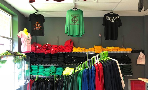 Photo of The Plug T-Shirt Store