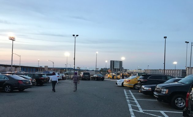 Photo of Black Car UBER LOT