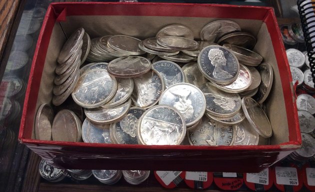 Photo of Century Stamps & Coins