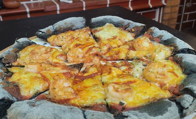 Foto de Pizzería Entre Fuego y Leña