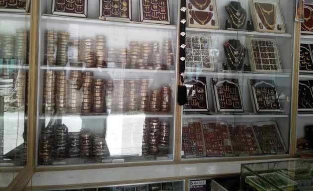 Photo of Sri Dharun Gold Covering