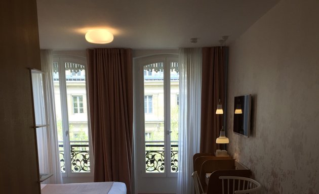 Photo de Hôtel Le Lapin Blanc