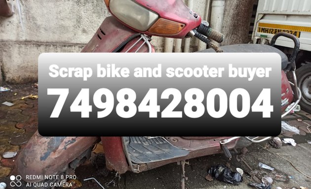 Photo of Scrap bike and car