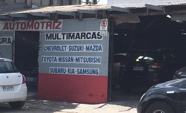 Foto de Desabolladura y pintura automotriz Garrido