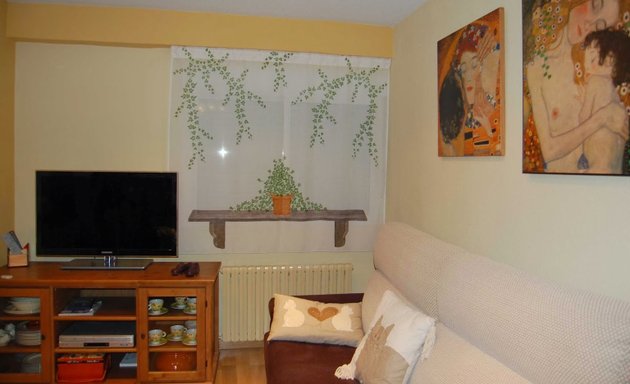 Foto de cortinas, estores y fundas nórdicas pintadas a mano