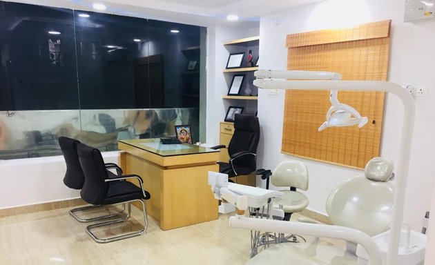 Photo of Dr. Adarsh Advanced Dental Care | Multispecialty Dental Clinic | Chamrajpet, Bangalore | Painless Root Canal Treatment | Dental Implants | Smile Makeover