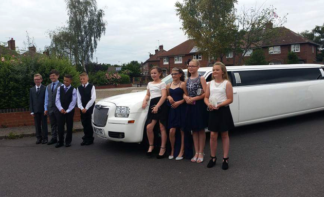 Photo of Men In White Limos