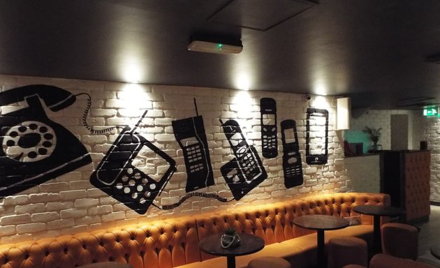 Photo of Evolution of the Telephone Mural by Paul Curtis