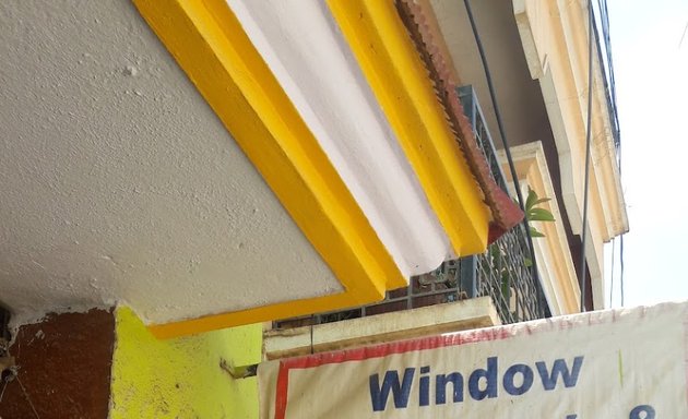 Photo of window mesh work and sofa covers
