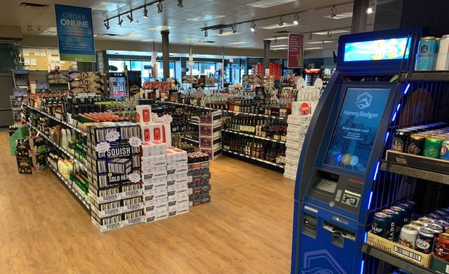 Photo of HoneyBadger Bitcoin ATM at West Coast Liquor Store