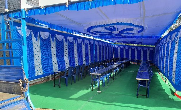 Photo of D T tent house lighting and sound system