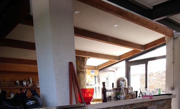 Photo de Bar Tabac De Saint Tronc- Restaurant le jardin