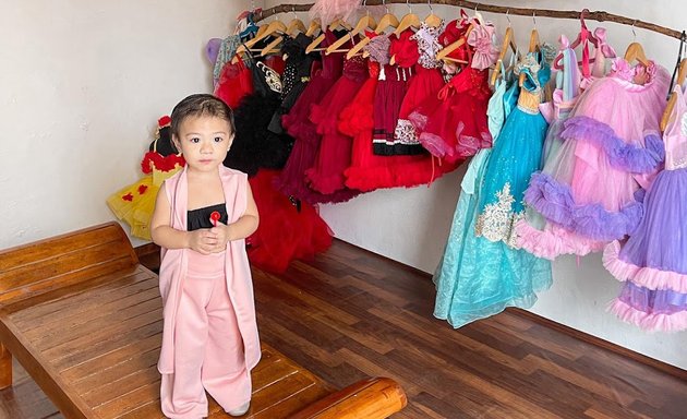 Photo of Sweet Ceige Kids Gown Rental