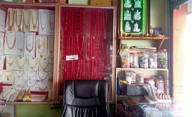 Photo of Sri Dharun Gold Covering