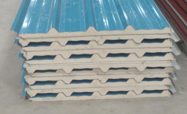 Photo of VIRAAT INDUSTRIES - Largest Manufacturers of Sandwich PUF Panel, Color Coated Metal Sheets, Color Coated Tile Roof Sheets, C & Z Purlins, Polycarbonate Sheets and Color Coated Accessories in South India