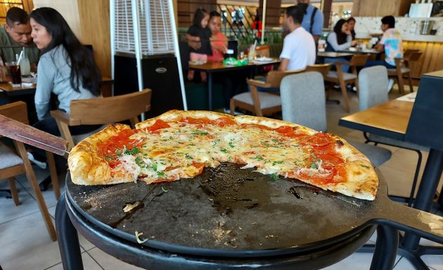 Foto de Quino's Pizzeria • Miraflores
