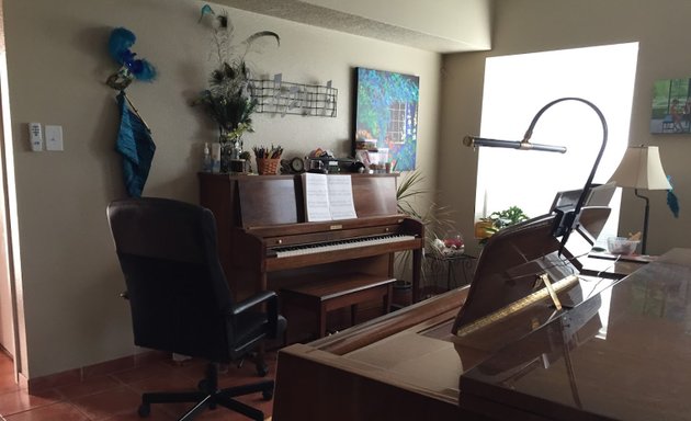 Photo of Piano with Ms. V