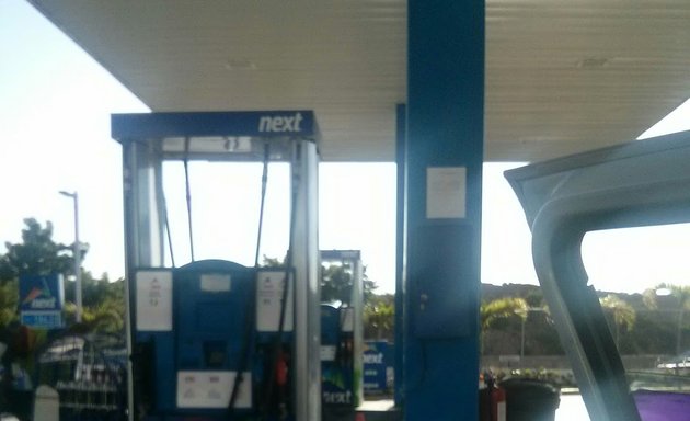 Foto de Estación De Gasolina Next