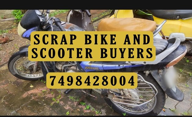 Photo of Scrap bike and car