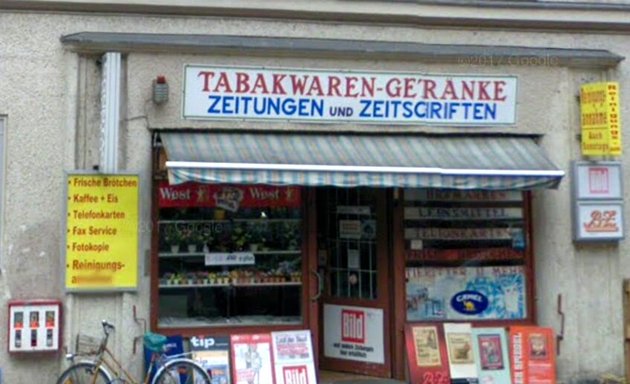 Foto von Tabakwaren - Zeitungen - Getränke