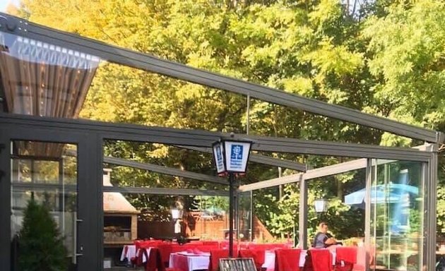 Foto von UNA Restaurant