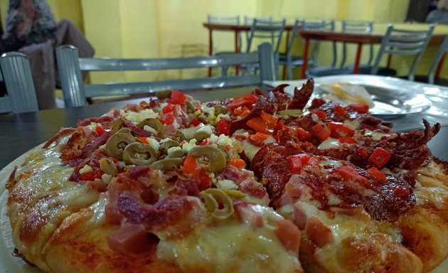Foto de Don Dera La Palmera . Restauran De Pizzas